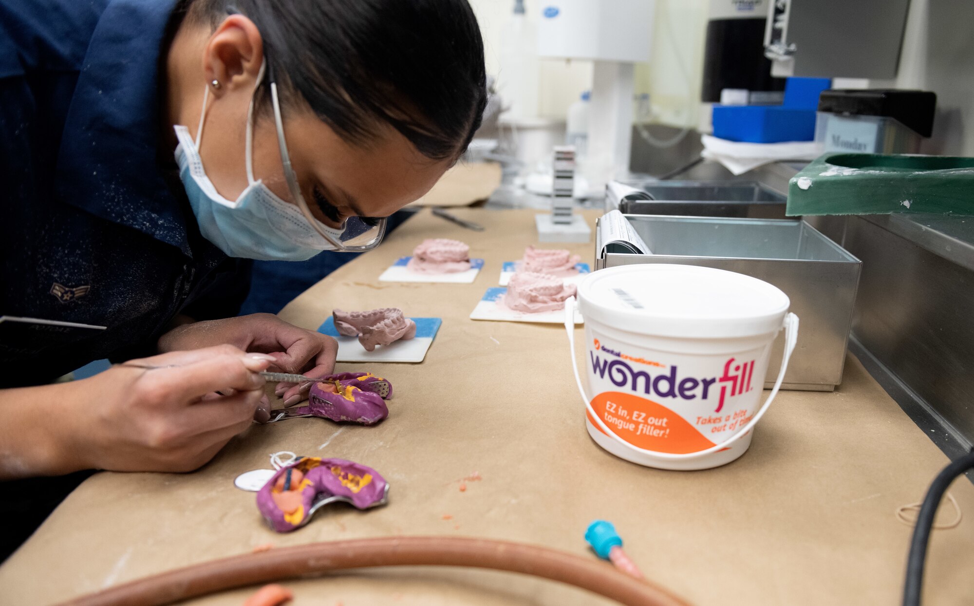 Photos of Airmen working inside the 60th Dental Squadron at Travis AFB
