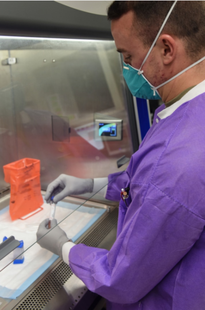 Staff Sgt. Cody Emery, 30th Medical Group medical lab technician, prepares a COVID test sample for processing April 8, 2021, Vandenberg Air Force Base, Calif.
