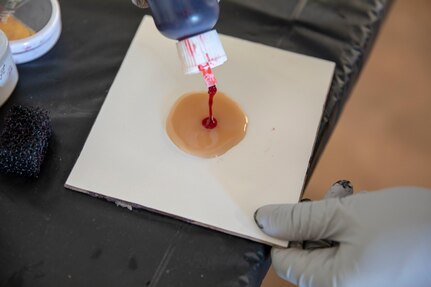 Behind the moulage