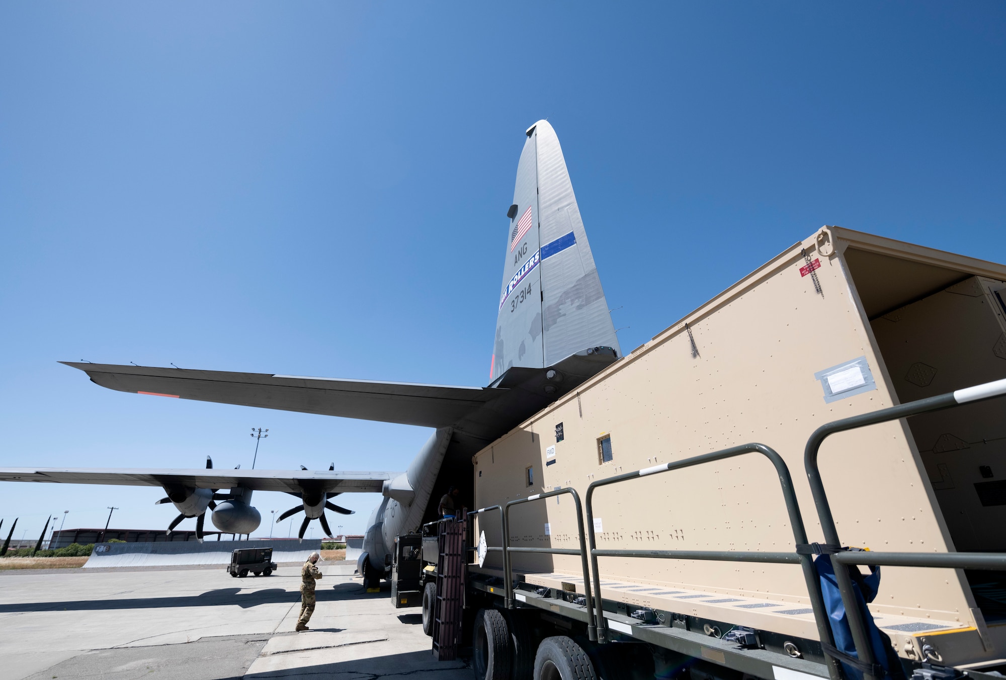 Photos of an NPCL being offloaded a C-130 at Travis AFB