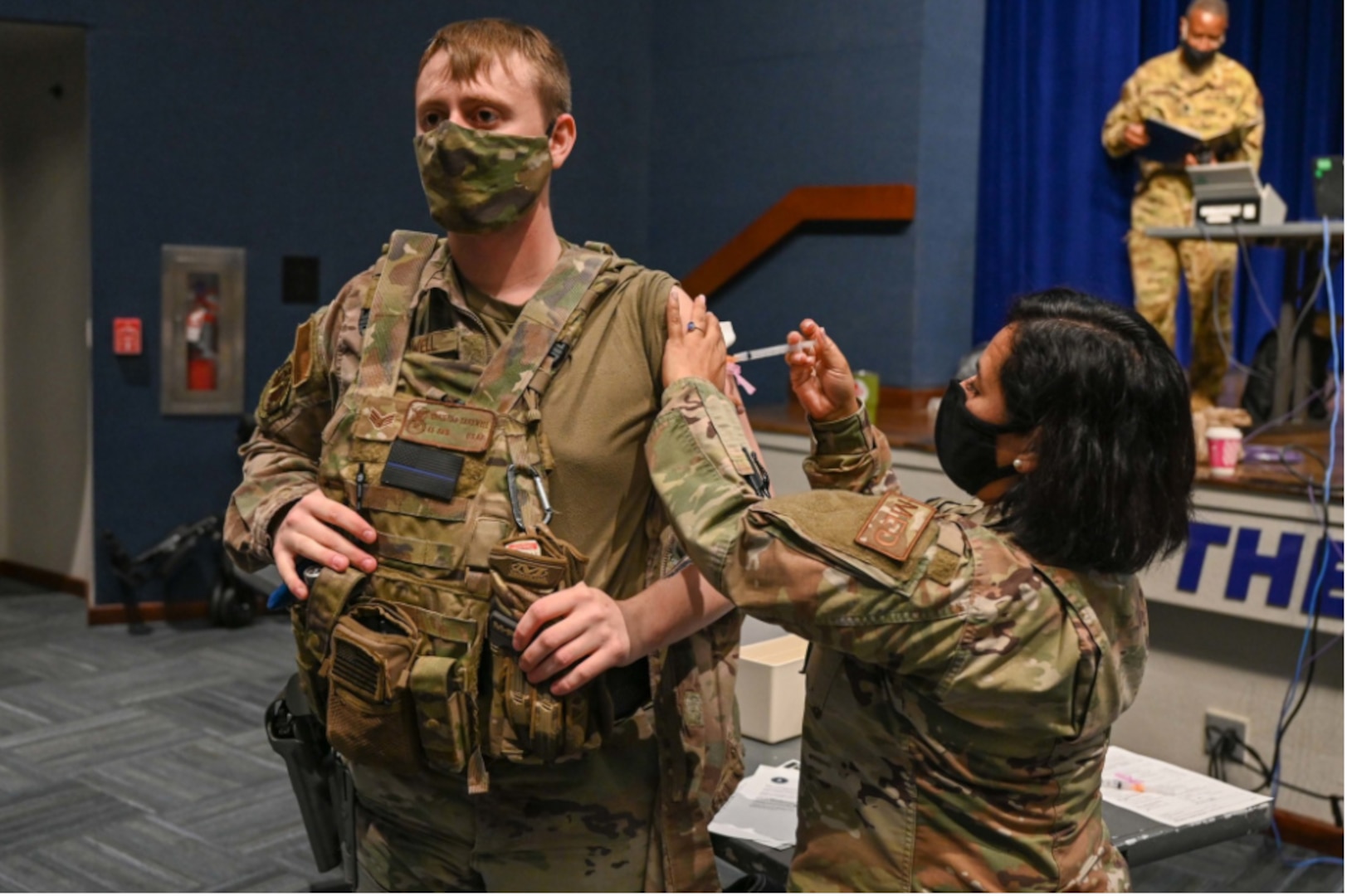 Senior Airman Christian Cardwell, 45th Security Forces Squadron Defender, receives a COVID-19 vaccine at Patrick Space Force Base, Fla., Jan. 14, 2021.