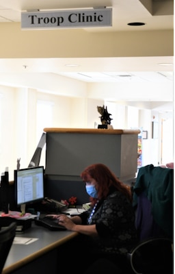 ROBINS AIR FORCE BASE, Ga. – Karen Harrison, 78th Medical Group Troop Clinic medical support assistant, catches up on other tasks in between helping Airmen at Robins Air Force Base, Georgia, March 3, 2021.