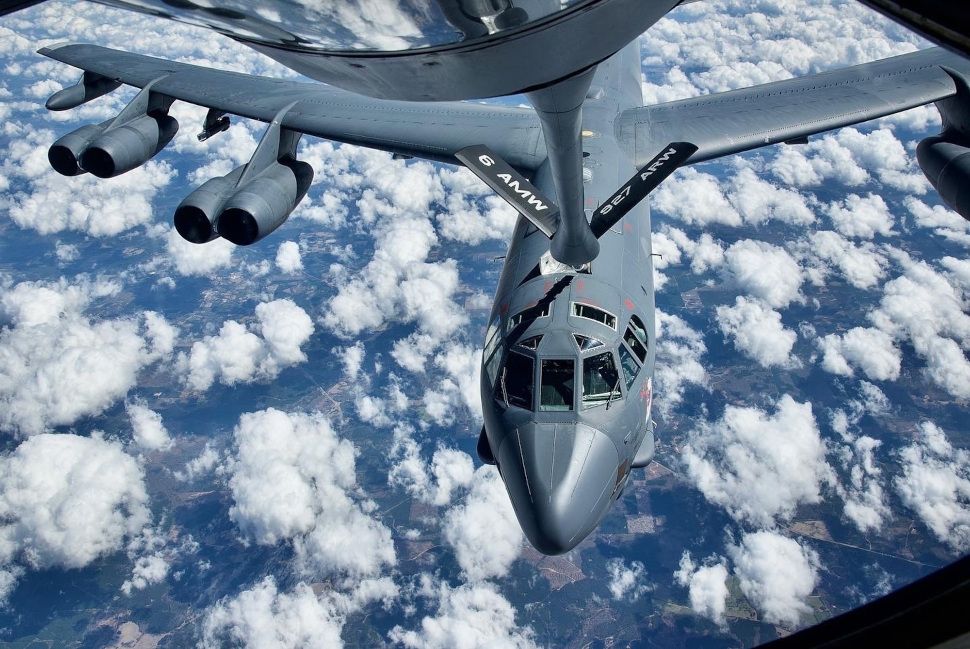 A U.S. Air Force KC-135 Stratotanker with the 927th Air Refueling Wing, Florida refuels a B-52 Stratofortress with the Barksdale Air Force Base, Louisiana, on February 26, 2021.  On this mission there were two Stratotankers that refueled three Stratofortresses. (U.S. Air Force photo by Tiffany A. Emery)