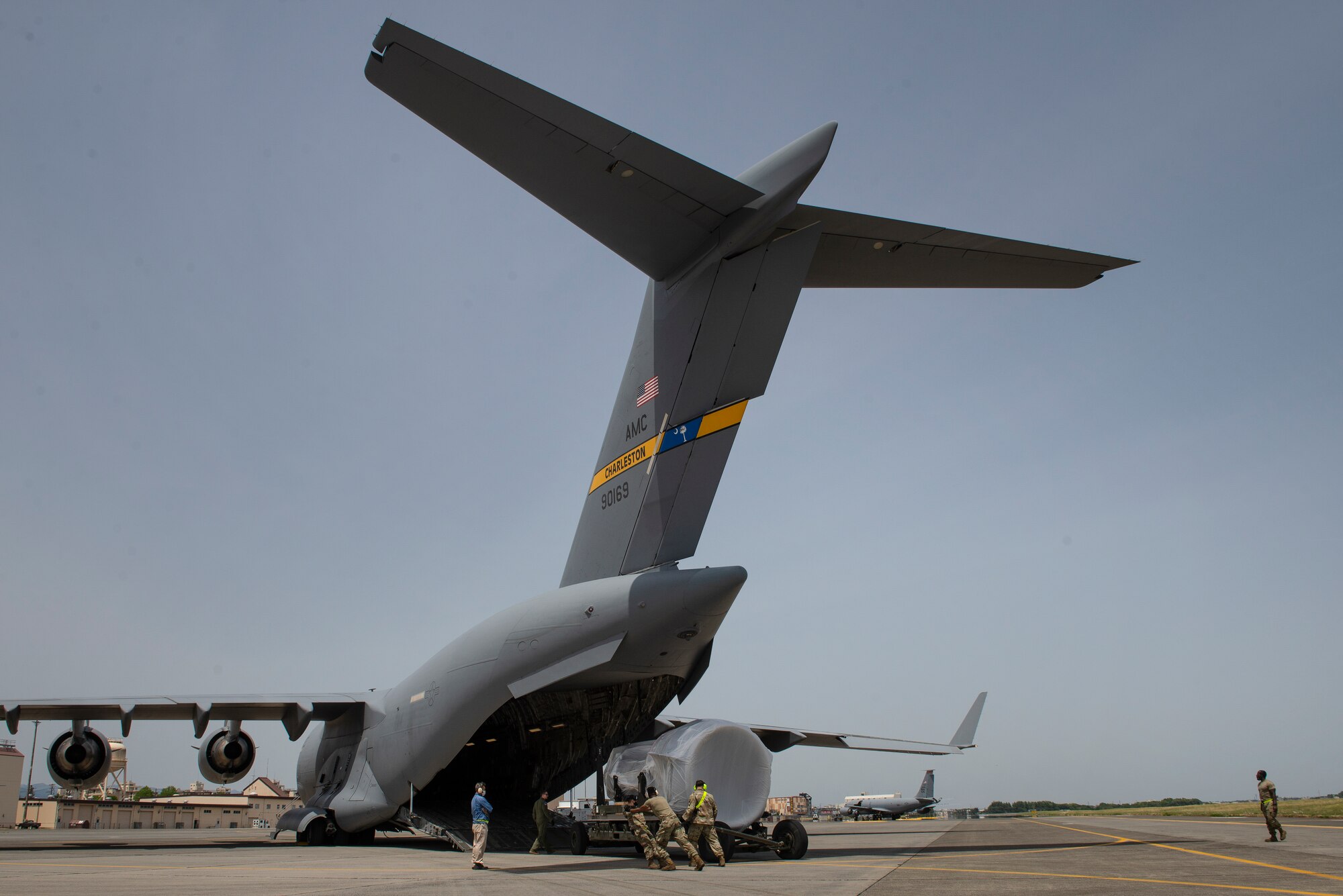 Airmen assigned to the 730th Air Mobility Squadron load a C-17 engine onto a C-17 Globemaster III, May, 4, 2021, at Yokota Air Base, Japan. The 730th AMS gave the engine to Kadena Air Base Airmen assigned to the 733rd AMS to enhance their training program, allowing maintainers to sharpen their skills on a real asset without the chance of damaging an operational aircraft. Finding ways to improve training helps increase the readiness and resilience of our force and ensures Pacific Air Forces’ ability to fight and win if needed.
