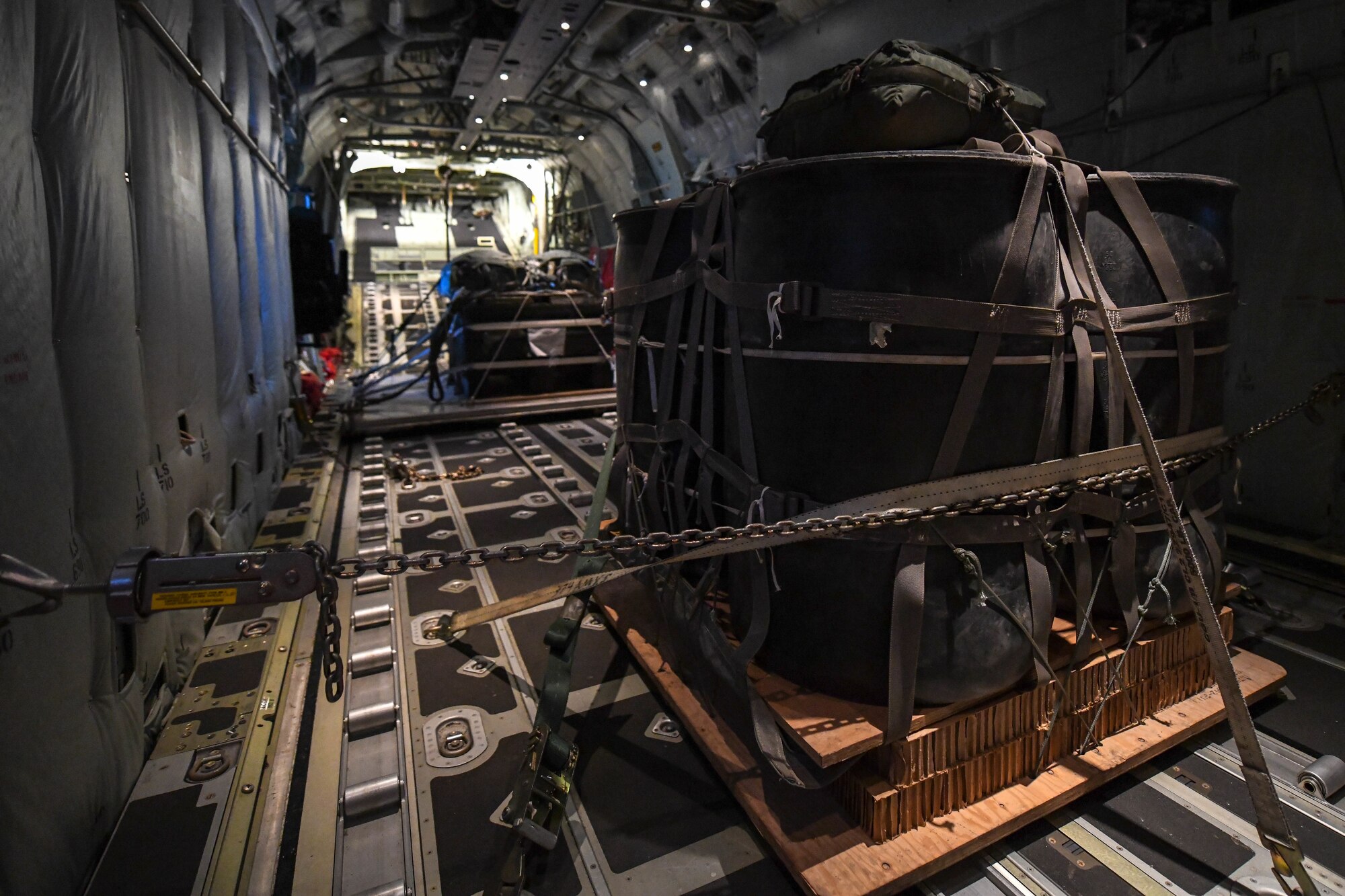 Cargo sits prepared for air drop over Camp Fuji aboard a C-130-J