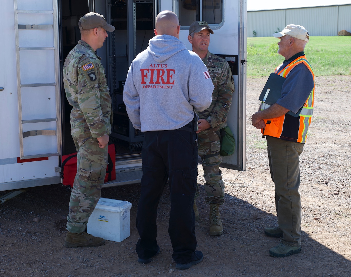 Members of the 63rd Civil Support Team, Oklahoma National Guard, partner with first responders as part of a 72-hour field exercise in Altus, Oklahoma, May 4-6, 2021.

This multi-day training event is one of several exercise scheduled around the state this year designed to test Guard members, emergency management personnel and first responders ability to quickly work to together during natural and man-made disasters. (Oklahoma National Guard photo by Lt. Col. Geoff Legler)