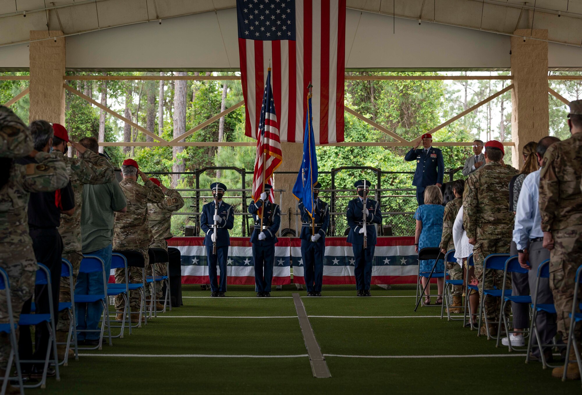 Members of the Hurlburt Field Honor Guard present the colors during a dedication ceremony at Hurlburt Field, Florida, May 6, 2021.