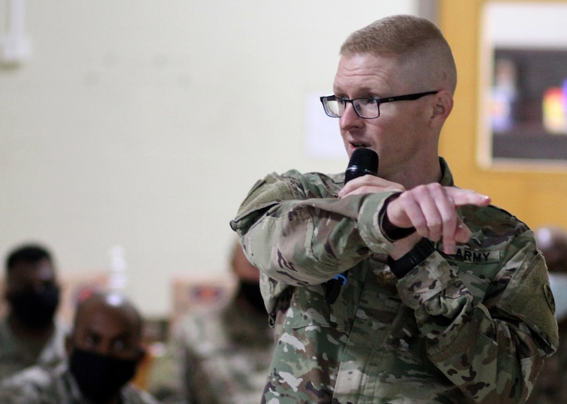 Army Reserve Maj. Eric Hughes, deployed to Camp Arifjan, Kuwait, serves as the 1st Theater Sustainment Command's operational post family life chaplain with the Indianapolis-based 310th Sustainment Command (Expeditionary), leads a discussion at the April 14, 2021 training for the camp's chaplains and enlisted religious affairs specialists. In his civilian career, Hughes said he is a licensed counselor at the Vet Center, Pontiac, Michigan.