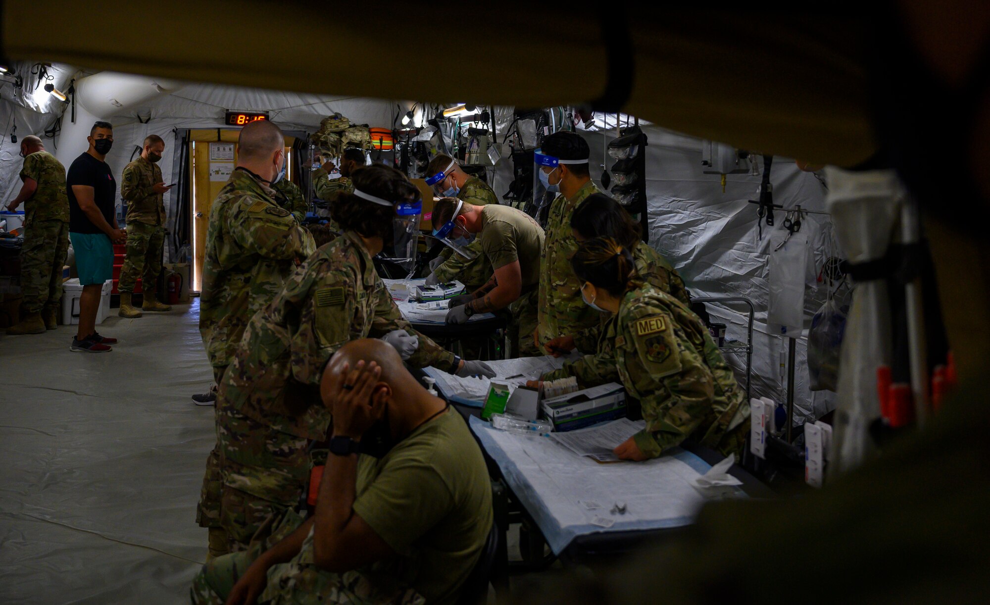 Medical personnel from the 378th Expeditionary Medical Squadron hosted a COVID-19 vaccine distribution event for joint forces at Prince Sultan Air Base, Kingdom of Saudi Arabia, May 4, 2021. The event was part of ongoing efforts to distribute more than 900 Janssen (Johnson & Johnson) COVID-19 vaccine doses, following the DoD Director of Health Affairs' direction for military treatment facilities to resume administration of the vaccine. DoD personnel are highly encouraged to take the vaccine to protect their health, their families, their community, and lower the public health risks associated with the COVID-19 pandemic. (U.S. Air Force photo by Senior Airman Samuel Earick)