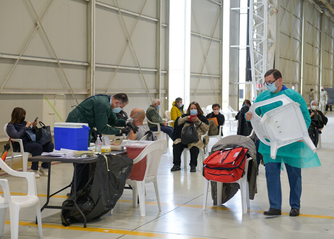A group of 31st Fighter Wing local nationals prepare to receive their first Moderna COVID-19 vaccine at Aviano Air Base, Italy, May 7, 2021. The vaccine is available to all 31st Fighter Wing local national employees. Local national employees make up a large percentage of Aviano’s workforce and are crucial to completing the mission. (U.S. Air Force photo by Airman 1st Class Brooke Moeder)