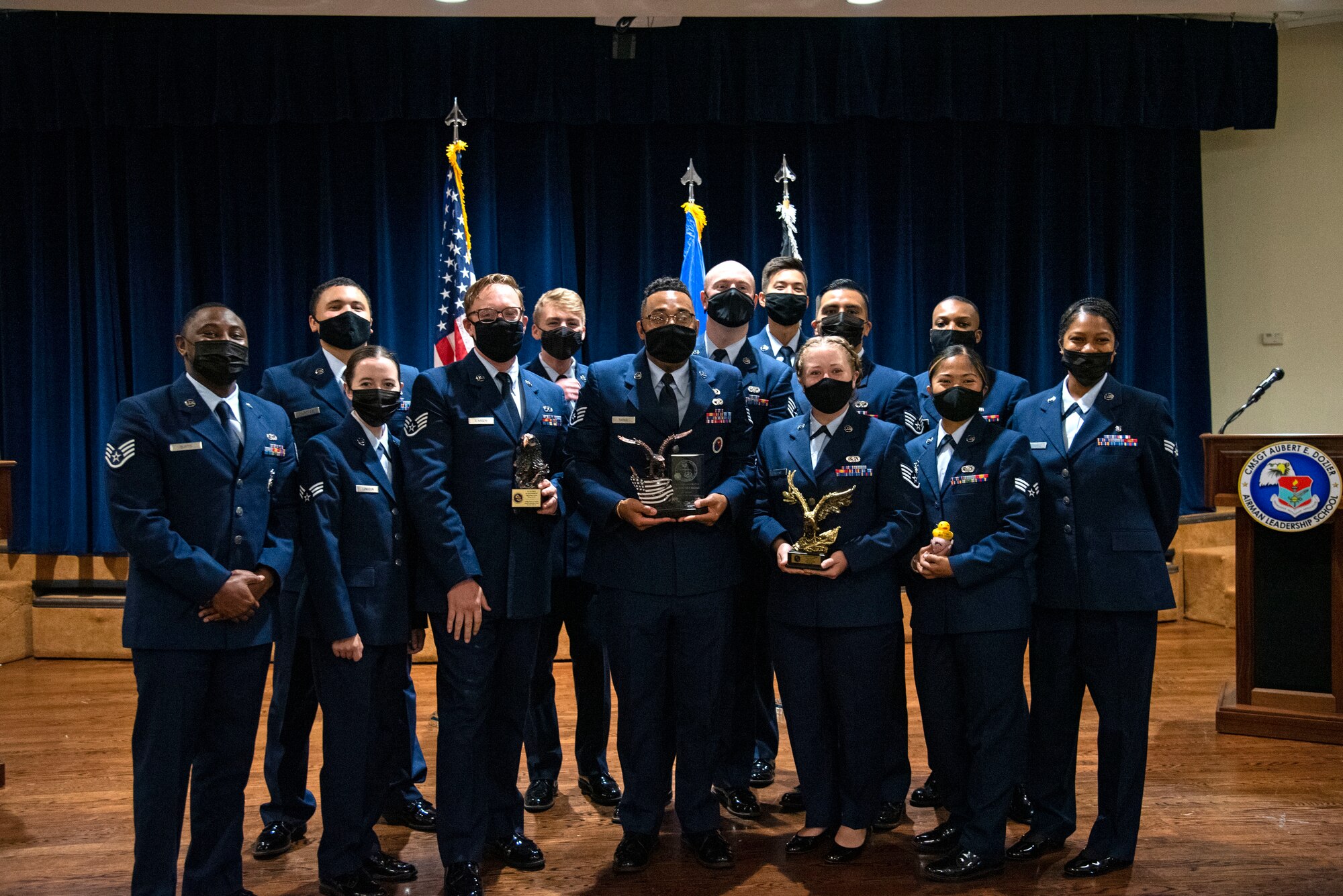 Airman Leadership School Class 21-D students, pause for a photo during a graduation ceremony, May 6, 2021, at MacDill Air Force Base, Florida.