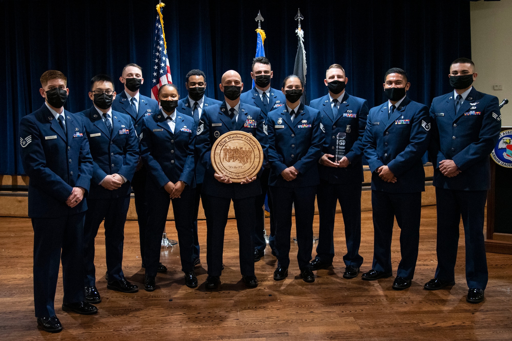 Airman Leadership School Class 21-D students, pause for a photo during a graduation ceremony, May 6, 2021, at MacDill Air Force Base, Florida.