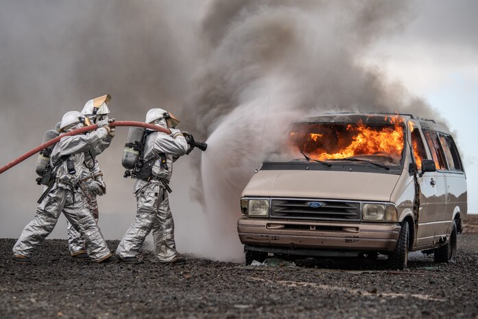 U.S. Marine Corps expeditionary firefighting and rescue specialists with Marine Wing Support Detachment, 15th Marine Expeditionary Unit, extinguish a vehicle fire during a controlled burn training event at Cold Bay airport, Alaska in support of Northern Edge 2021. U.S. service members are participating in a joint training exercise hosted by U.S. Pacific Air Forces May 3-14, 2021, on and above the Joint Pacific Alaska Range Complex, the Gulf of Alaska, and temporary maritime activities area. NE21 is one in a series of U.S. Indo-Pacific Command exercises designed to sharpen the joint forces’ skills; to practice tactics, techniques, and procedures; to improve command, control and communication relationships; and to develop cooperative plans and programs.