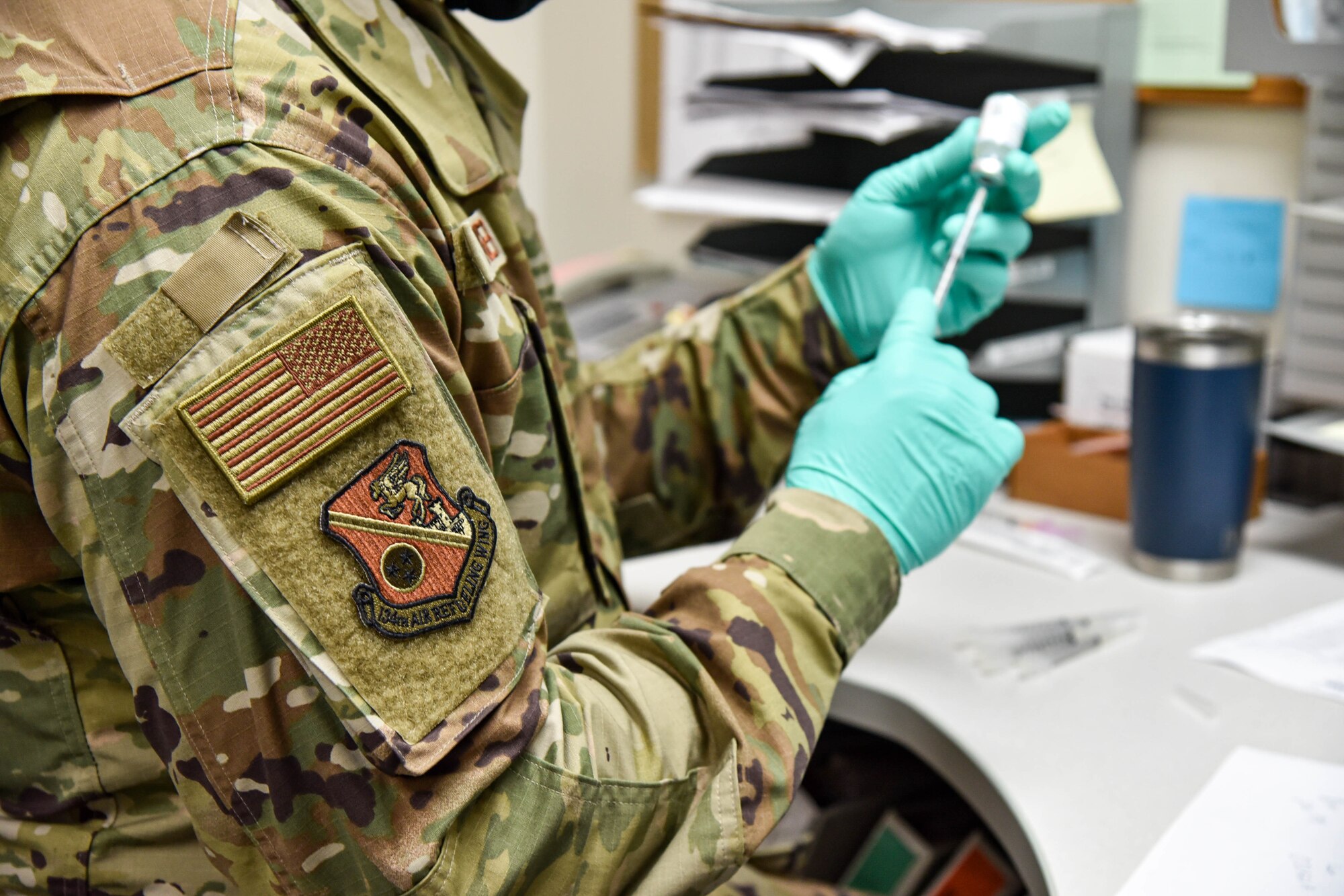 2nd Lt. David Wenger, a clinical nurse with the 134th Medical Group, prepares COVID-19 vaccine shots. Members of the 134th Air Refueling Wing were eligible to receive their COVID-19 vaccines during Unit Training Assembly here May 2nd, 2021.