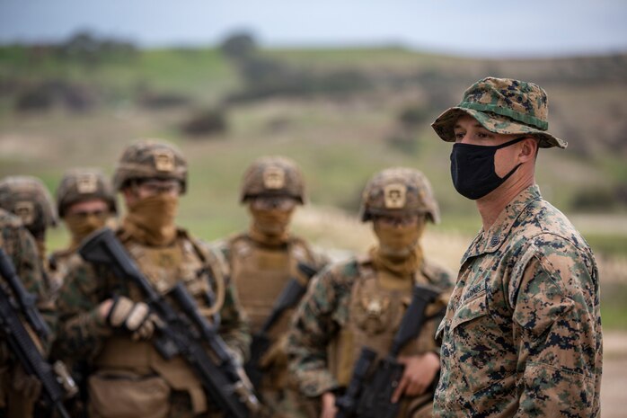 U.S. Marine Staff Sgt. Alexander Teegarden, a platoon commander with Alpha Company, Infantry Training Battalion, School of Infantry - West, gives a safety brief to students before a fire and movement exercise on Range 215A as part of the sixth week of the Infantry Marine Course on Marine Corps Base Camp Pendleton, Calif., March 3, 2021. IMC is a 14-week pilot course designed to create better trained and more lethal entry-level infantry Marines prepared for near-peer conflicts. The course uses a redesigned learning model for students intended to develop their capabilities for independent and adaptive thought and action. The program of instruction for IMC has been in development for a year and follows guidance from the 2019 Commandant's Planning Guidance and Force Design 2030.