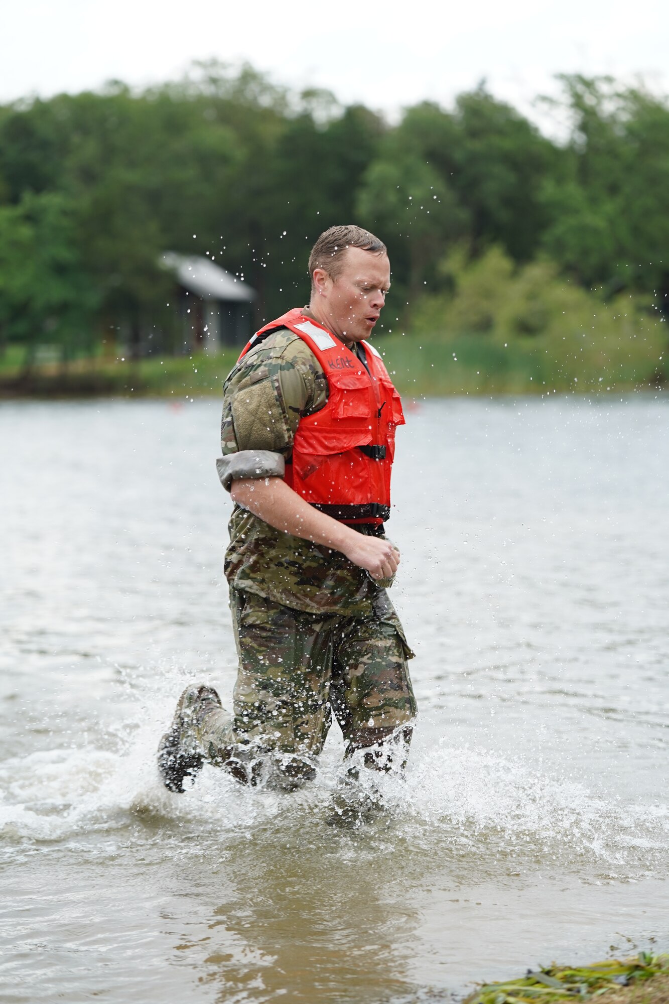 Soldier runs in water