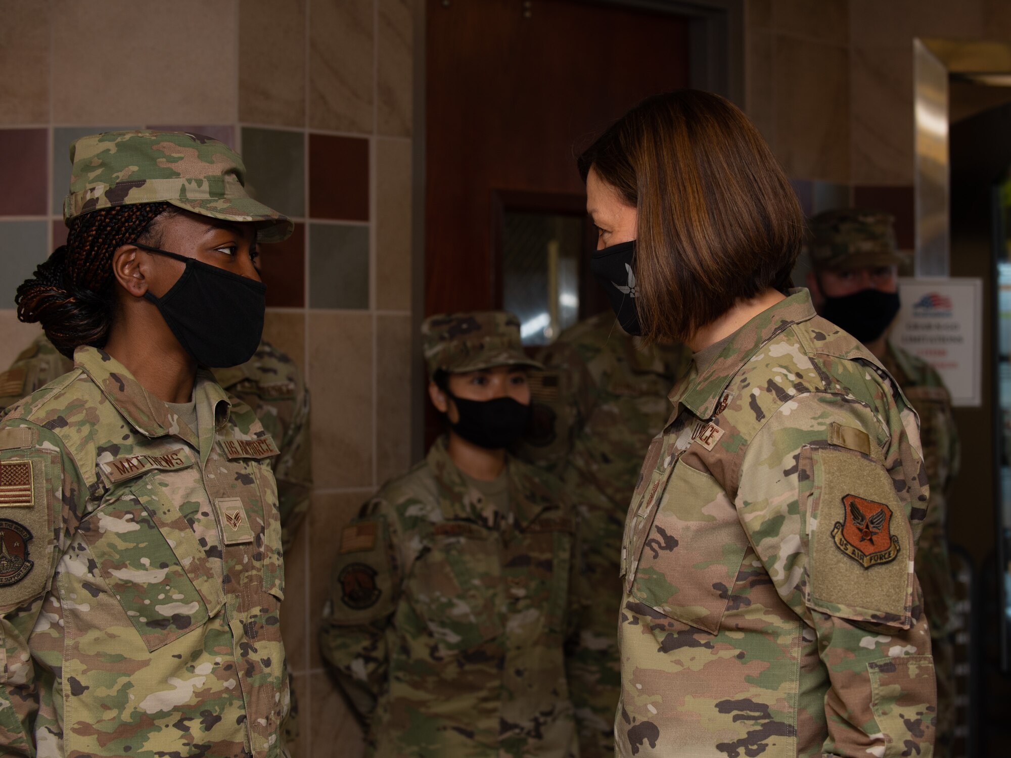 Chief Bass speaks with the DFAC personnel