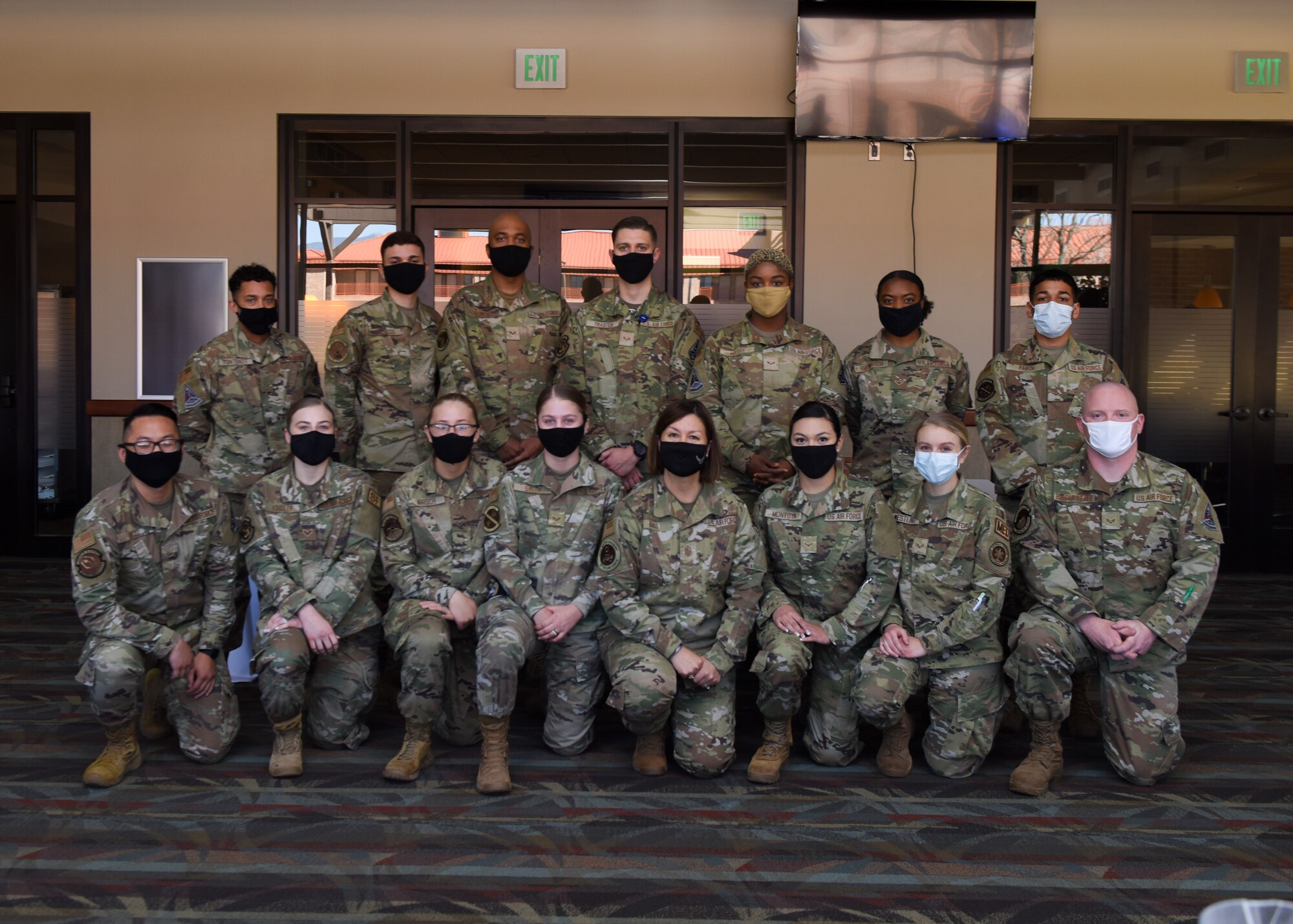 Chief bass poses for a group photo with P-S GAR Airmen