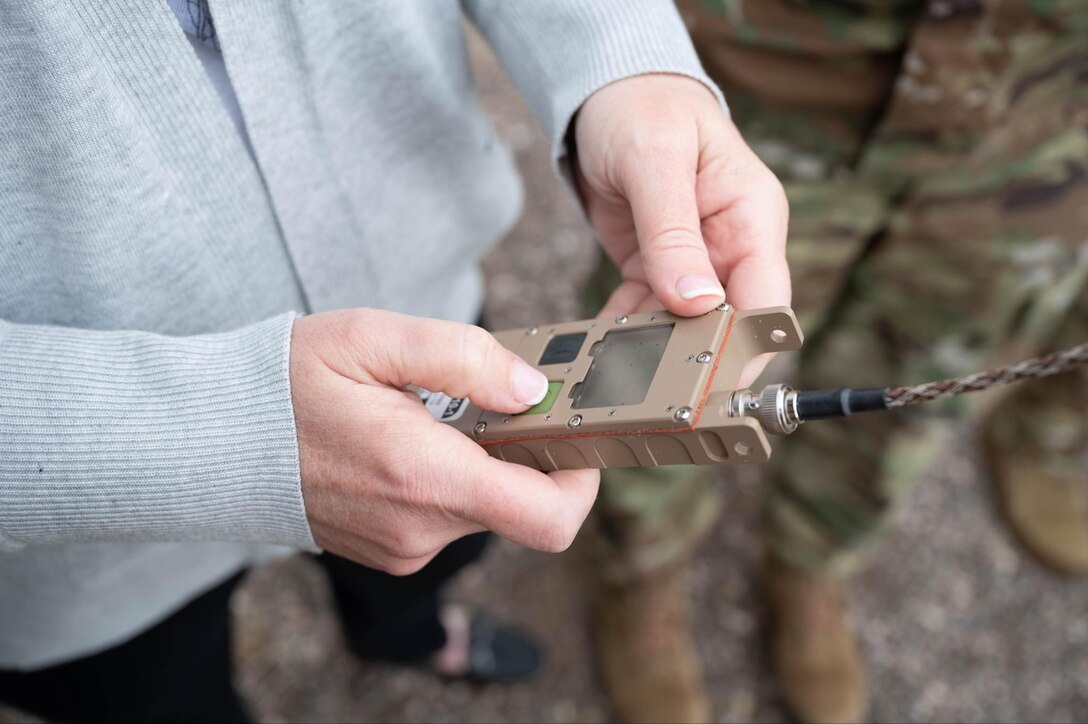 Stephanie Weatherington, wife of Maj. Gen. Mark Weatherington, 8th Air Force and Joint-Global Strike Operations Center commander, detonates explosives during a 28th Civil Engineer Squadron demonstration during the general’s visit to Ellsworth Air Force Base, S.D., May 4, 2021.