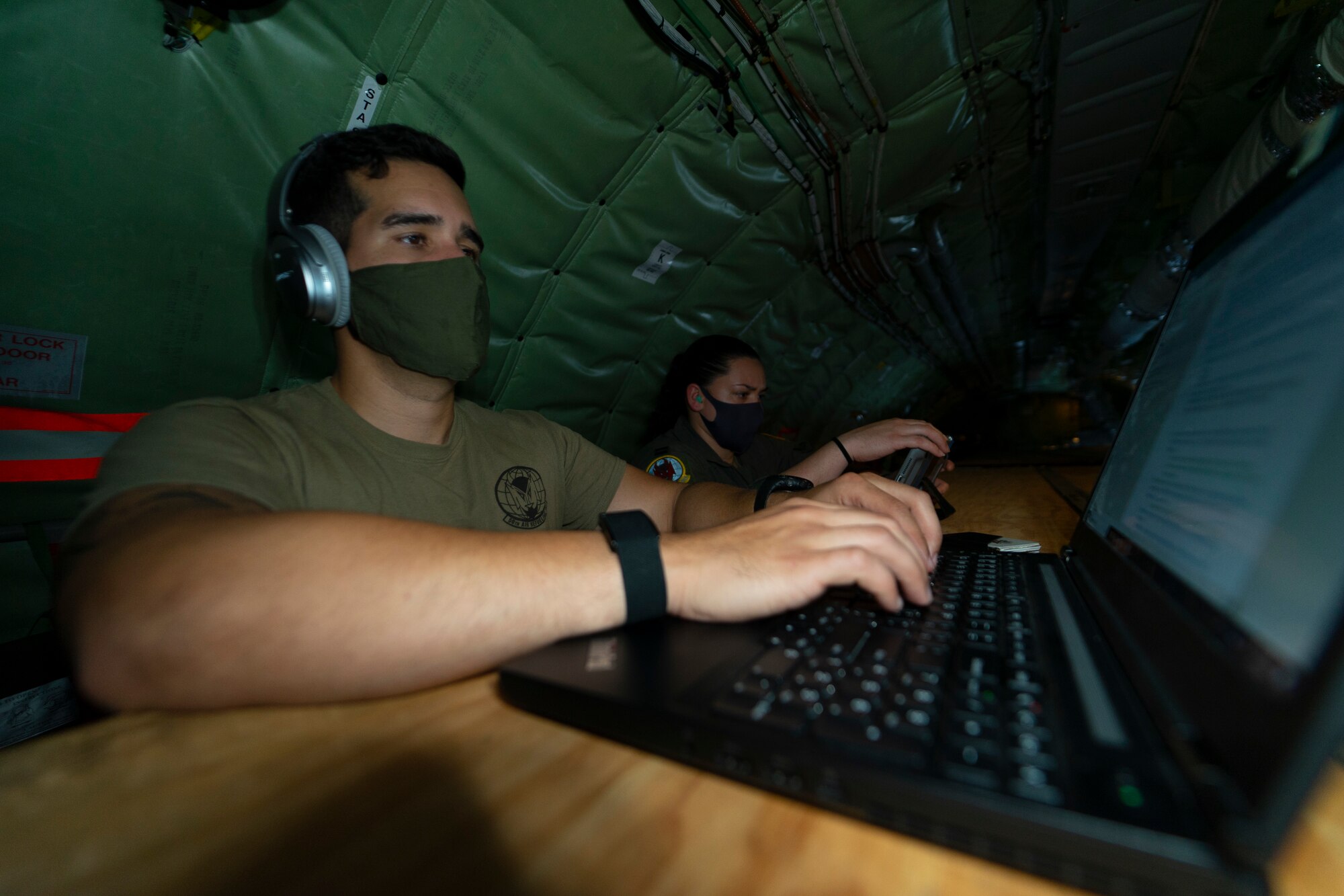 U.S. Air Force Capt. Joel Gonzalez, 6th Operational Support Squadron’s chief of wing tactics, assigned to MacDill Air Force Base (AFB), Florida, prepares in-flight for a training exercise at Barksdale AFB, Louisiana, April 19, 2021. Airmen from the 50th Air Refueling Squadron, assigned to MacDill AFB, performed integrated training alongside the 96th Bomber Squadron.
