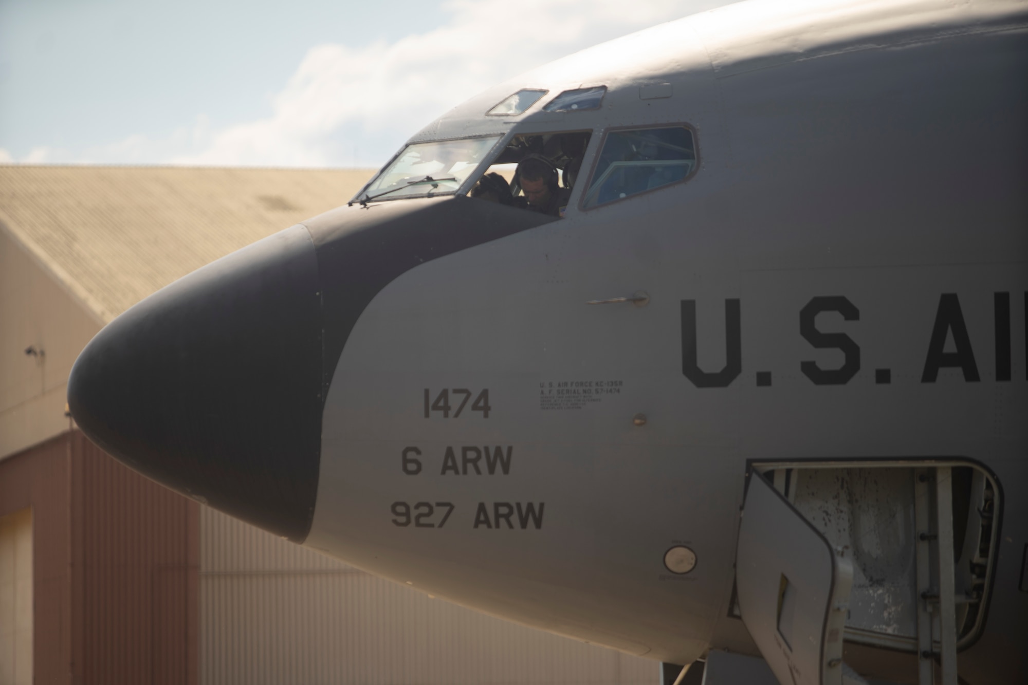 U.S. Air Force Lt. Col. Keegan Maple, a pilot assigned to the 50th Air Refueling Squadron, conducts pre- flight checks, April 20 2021, before taking off for a training flight from Barksdale Air Force Base (AFB), Louisiana. The crew completed multiple training objectives during training operations at the Barksdale AFB.