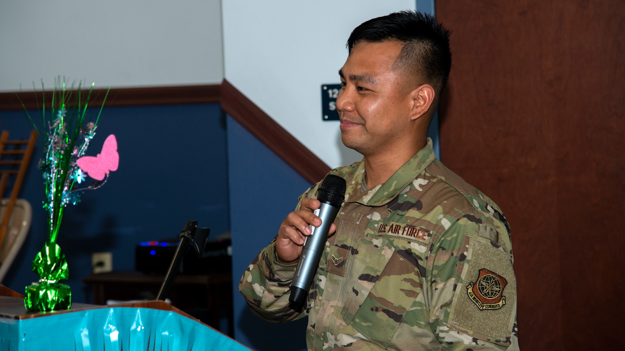 U.S. Air Force Airman 1st Class Arfaneil Rebujio, a 6th Logistics Readiness Squadron Vehicle Management maintainer, speaks at an Asian American Pacific Islander Heritage Month luncheon at MacDill Air Force Base, Florida, May 6, 2021.