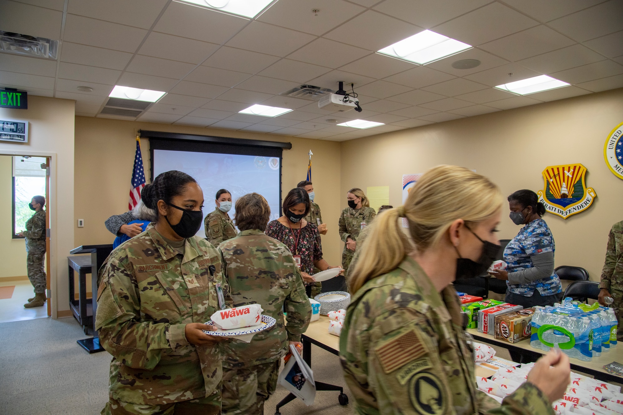 Airmen from the 6th Medical Group gather to eat and celebrate the start of Nurse and Tech Week at MacDill Air Force Base, Florida May 6, 2021.