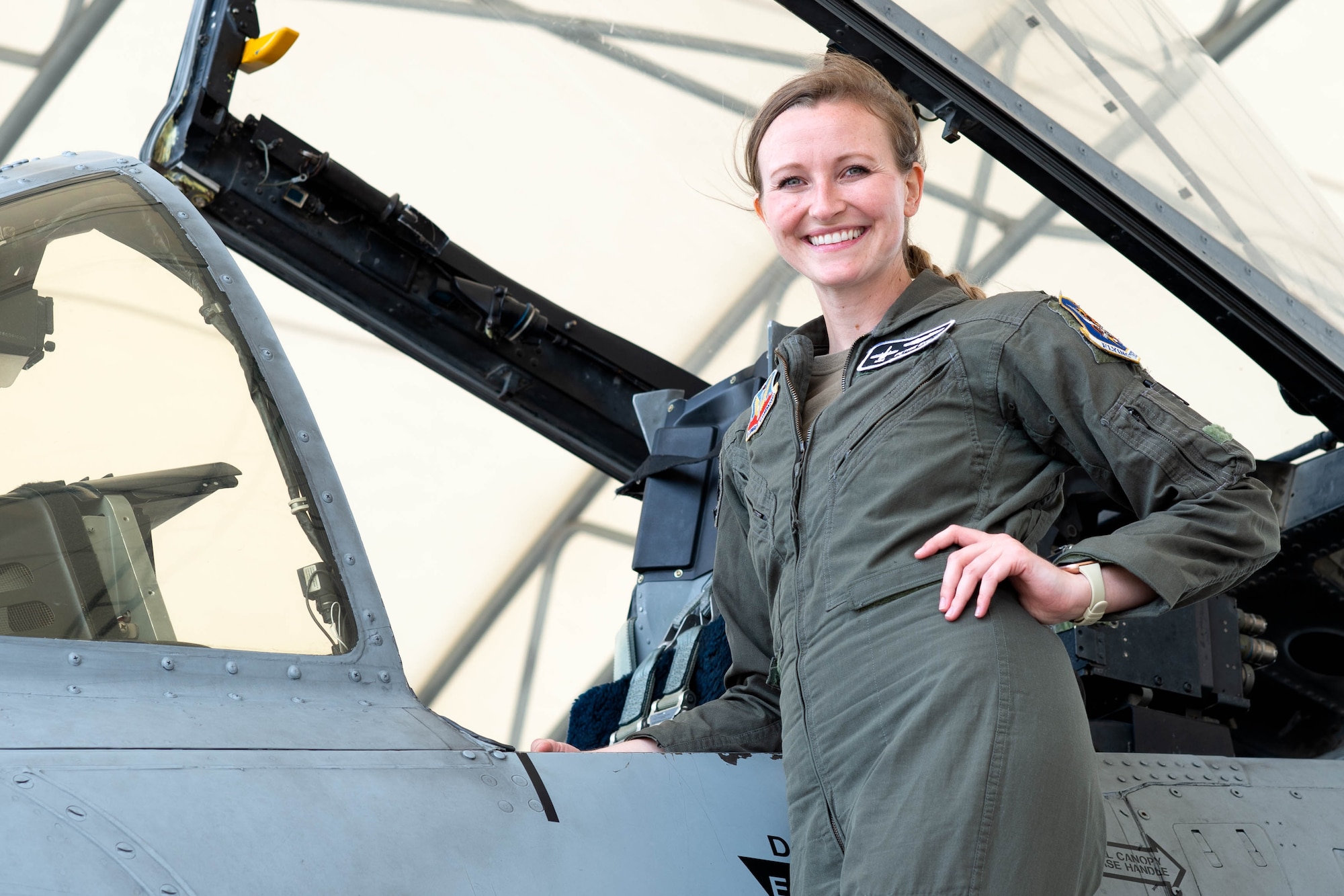 A photo of Captain Bye posing in front of aircraft.