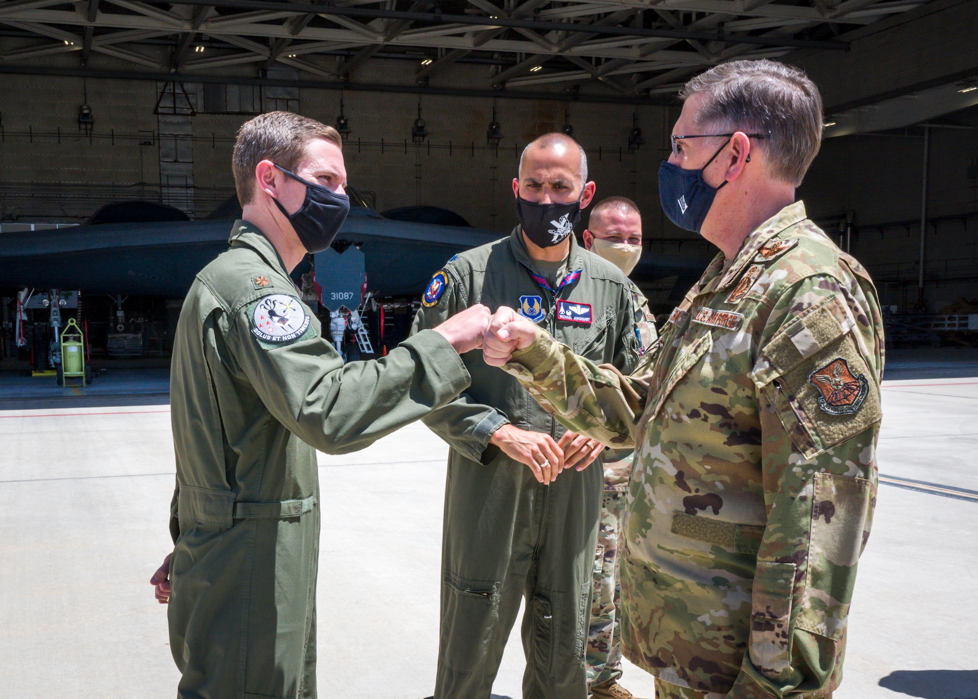 Maj. Matthew Gray, 419th Flight Test Squadron, greets Gen. Timothy Ray, Air Force Global Strike Command commander, during his visit to Edwards Air Force Base, California, May 5. (Air Force photo by Giancarlo Casem)