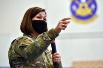 Chief Bass speaks at an all call at Schriever Air Force Base