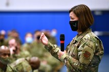 Chief Bass speaks at an all call at Shriever Air Force Base