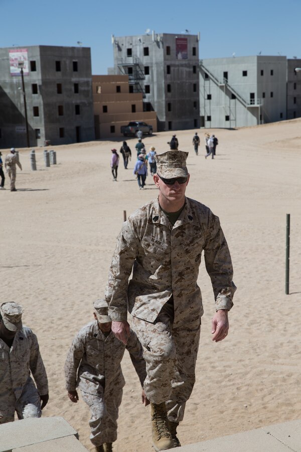The 19th Sergeant Major of the Marine Corps, Sgt. Maj. Troy E. Black, tours Range 220 during Marine Air Ground Task Force Warfighting Exercise (MWX), 3-21 at Marine Corps Air Ground Combat Center, Twentynine Palms, California, May 4, 2021. MWX is the culminating event of the Service Level Training Exercise, challenging the MAGTF to fight against a free thinking adversary with similar capabilities in a force on force environment. (U.S. Marine Corps photo by Lance Cpl. Christian Hooper)
