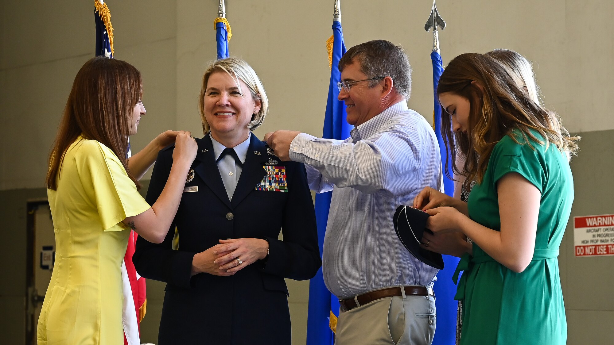 Brig. Gen. McCauley von Hoffman, Ogden Air Logistic Complex commander, is pinned with the rank of major general during a promotion ceremony at Hill Air Force Base, Utah, May 7, 2021. (U.S. Air Force photo by R. Nial Bradshaw)