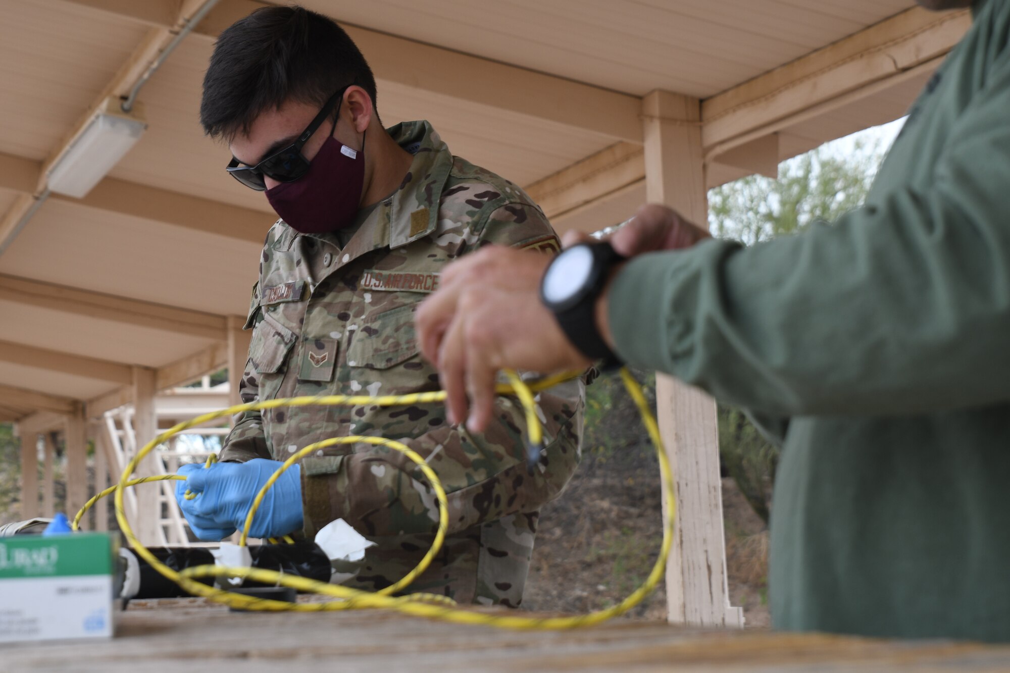 An Airman learning to prepare explosives for demolition training