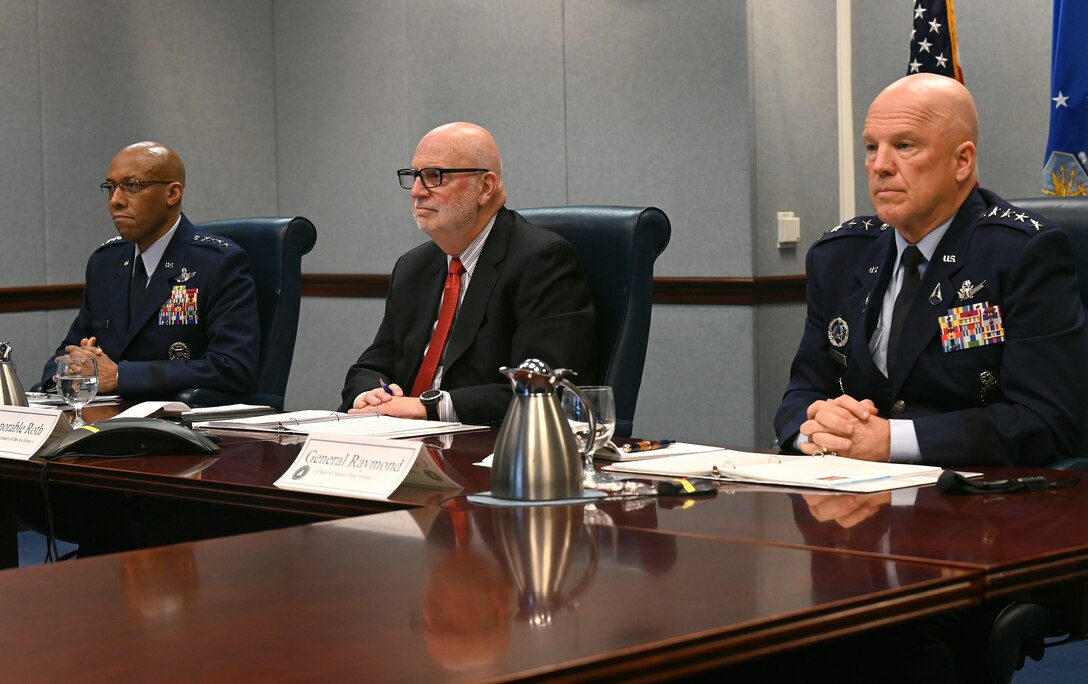 Acting Secretary of the Air Force John P. Roth (center), Chief of Staff of the Air Force Gen. Charles Q. Brown Jr. (left) and Chief of Space Operations Gen. John W. "Jay" Raymond prepare to answer questions during the House Appropriations Committee on Defense during a virtual hearing at the Pentagon, Arlington, Va., May 7, 2021. Committee members raised topics that included confronting new and emerging threats, air and space superiority, and nuclear deterrence.
