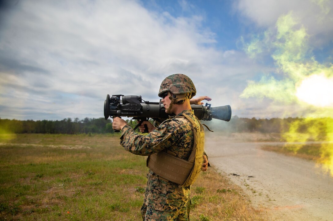 A Marine fires a shoulder held weapon system