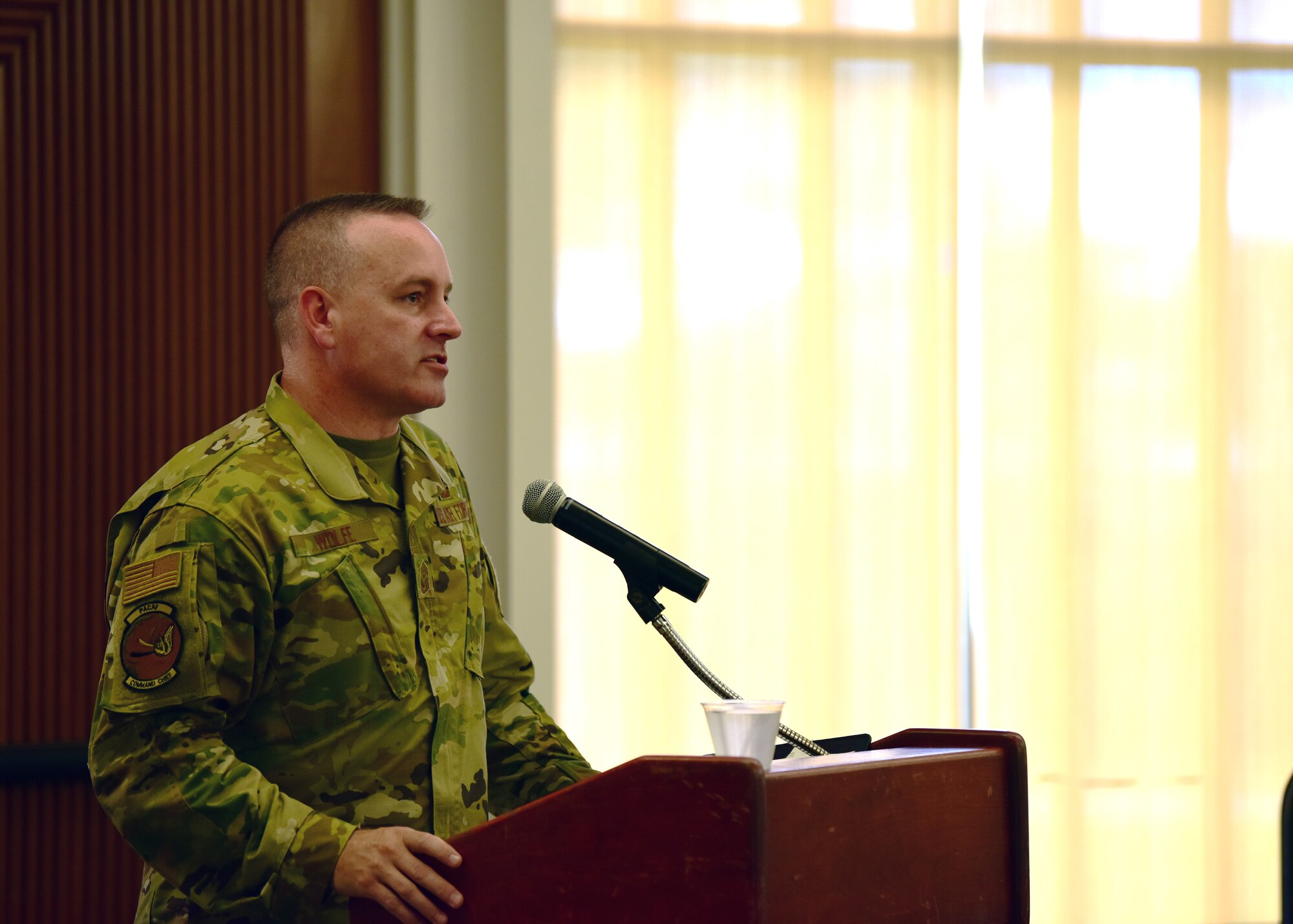 Photo of U.S. Air Force chief master sergeant briefing