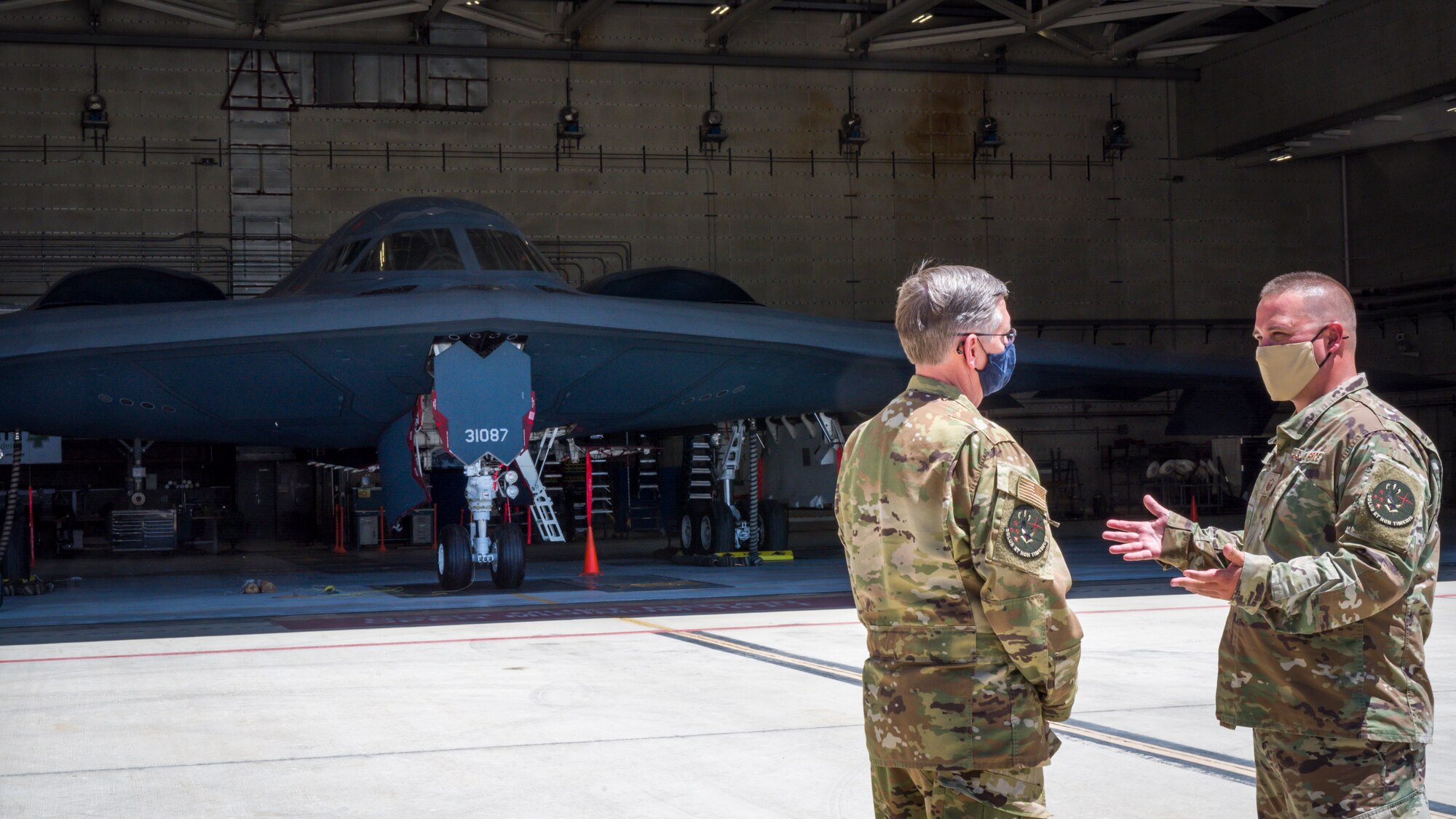 Master Sgt. Brock Schuld, 131st Aircraft Maintenance Squadron, discusses current B-2 weapons upgrades and modernization with Gen. Timothy Ray, Air Force Global Strike Command commander, during his visit to Edwards Air Force Base, California, May 5. (Air Force photo by Giancarlo Casem)