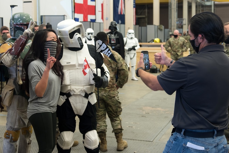 Combined Space Operations Center team members pose with volunteers from the 501st Legion, a film-quality Star Wars costume club.