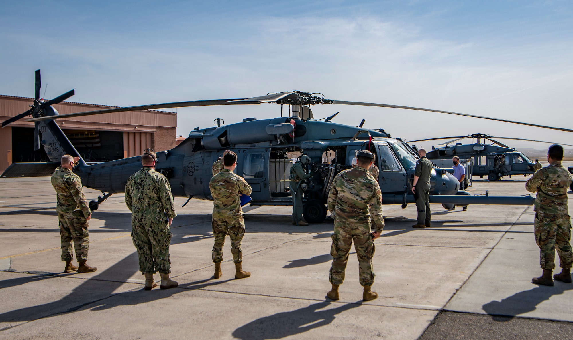 Airmen observe pre-flight checks on the flight line.