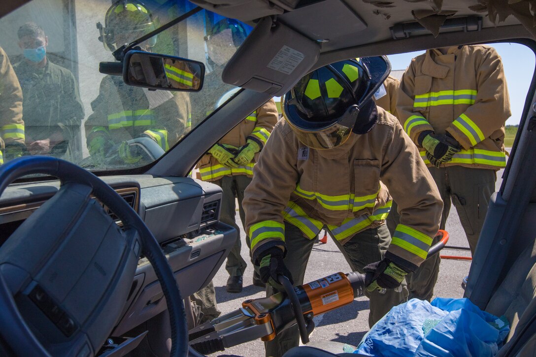 A U.S. Marine with Aircraft, Rescue and Firefighting Marine, uses a Holmatro brand hydraulic separator during a training event on Marine Corps Air Station Cherry Point, N.C., April 23, 2021. The training introduced new Marine Corps standardized weapons to Cherry Point and a Holmatro representative demonstrated efficient rescue techniques.