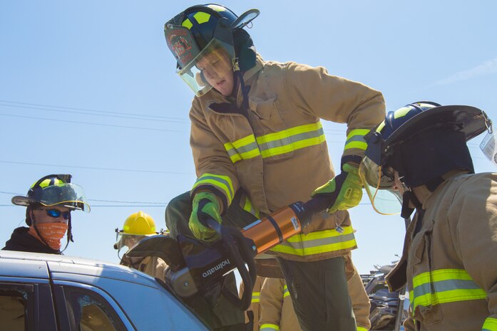 U.S. Marine Corps Tyler Tesch with Aircraft, Rescue and Firefighting  Marine, uses Holmatro Jaws of Life during a training event on Marine Corps Air Station Cherry Point, N.C., April 23, 2021. The training introduced the new Marine Corps standardized weapons to Cherry Point and demonstrated efficient rescue techniques.