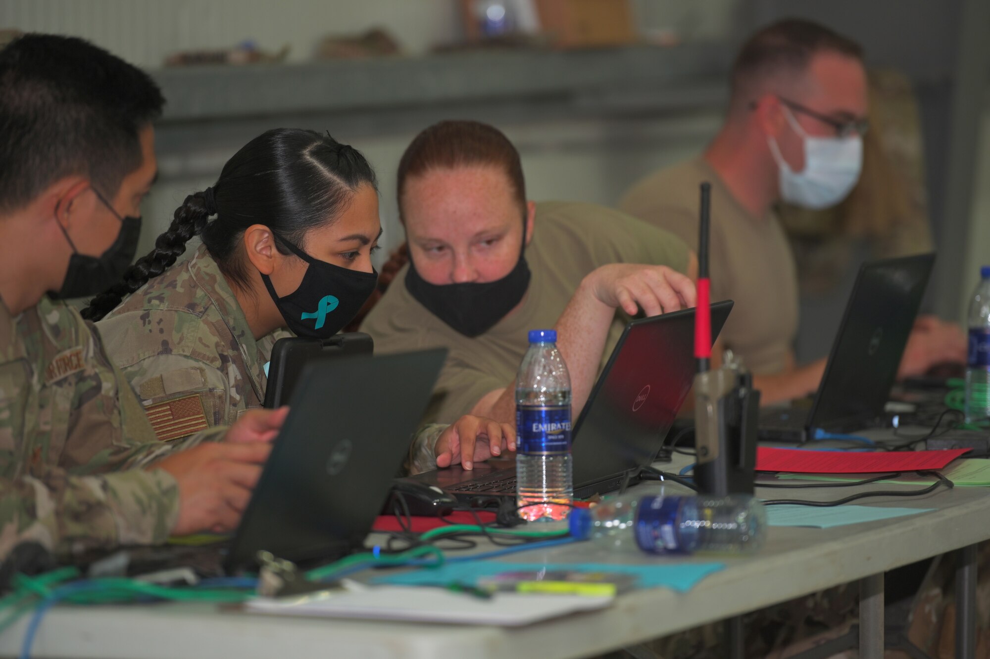 U.S. Army and Air Force troops receive their vaccinations at the COVID-19 vaccine point of distribution at Al Dhafra Air Base, United Arab Emirates, May 1, 2021. This is the second large batch of the Janssen vaccine received by the 380th EMDG, with a total of 1,400 vaccines to be administered to Department of Defense personnel in country. (U.S. Air Force photo by Staff Sgt. Jao’Torey Johnson)