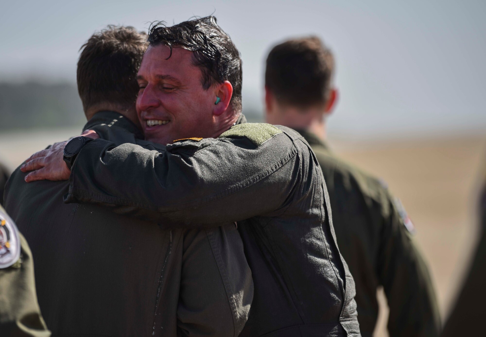 two men hugging
