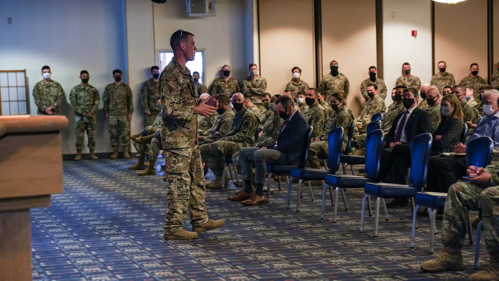 Colonel Campbell speaks to a crowd in the Enlisted Club