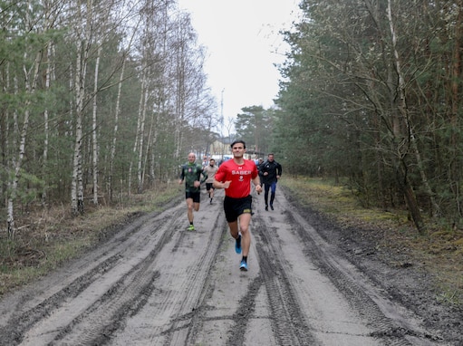 U.S. Army 1st Lt. Kyle Warner, 1st Armored Brigade Combat Team, 1st Cavalry Division, competes in the inaugural Better Opportunities for Single Soldiers Poland event, a 5K competition held at Zagan Forward Operating Station, Poland, April 15, 2021. BOSS Poland is the first-ever BOSS program to be established for deployed and rotational troops, instituted by a U.S. Army Reserve civil affairs team. (Photo by Maj. Marcellus Simmons, 1-1 ABCT Public Affairs)