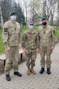 Sgt. Bradley Taylor, center, a medic with the Pennsylvania National Guard's 108th Medical Company Area Support, with two Lithuanian Army Soldiers on a Lithuanian Army base in Marijampole, Lithuania, where Taylor is providing medical support to U.S and Lithuanian troops. The 108th MCAS deployed to Europe in late February to provide medical support to U.S. and allied rotational forces in the region.