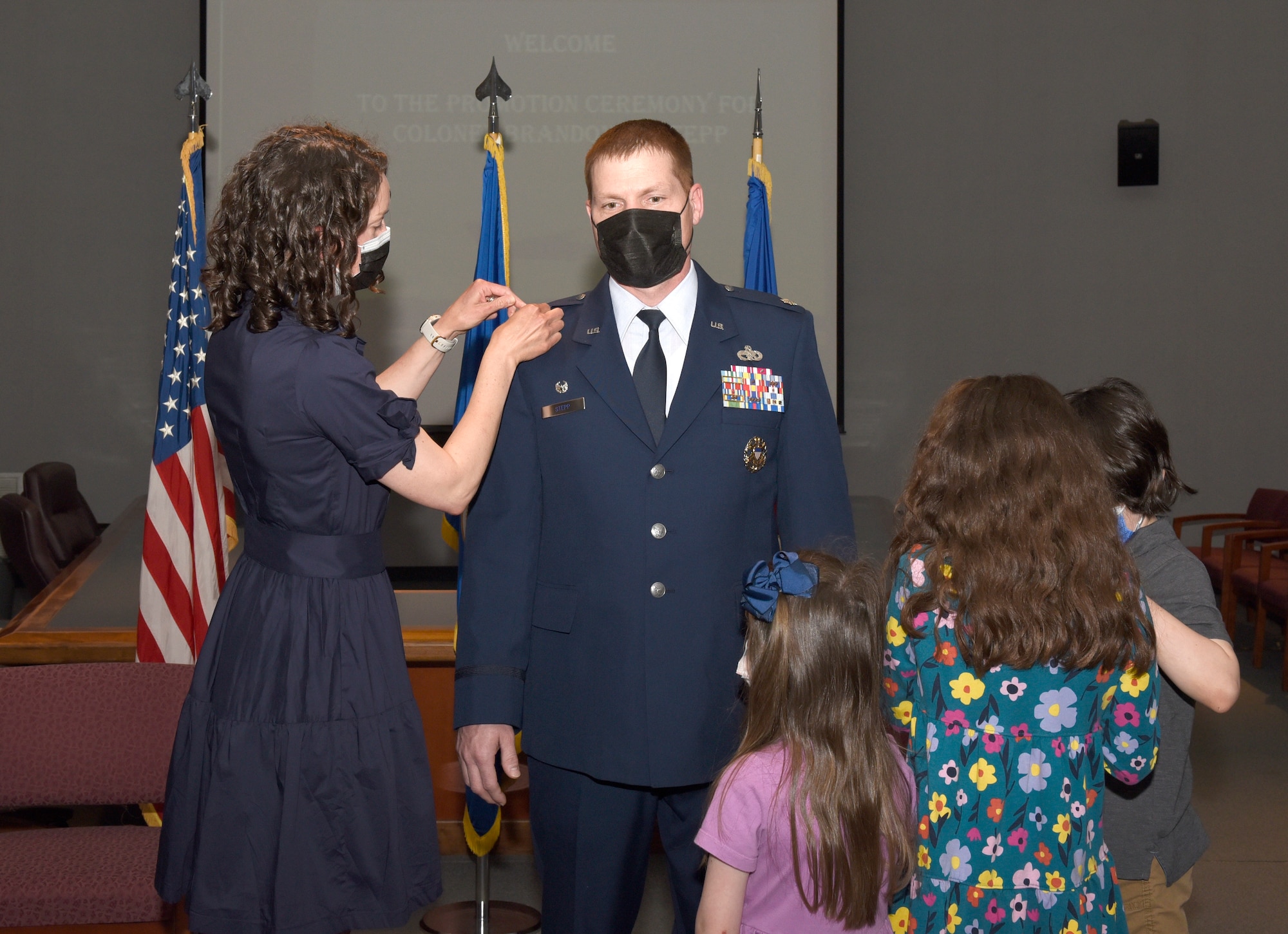 Colonel Stepp's family pins on his new rank