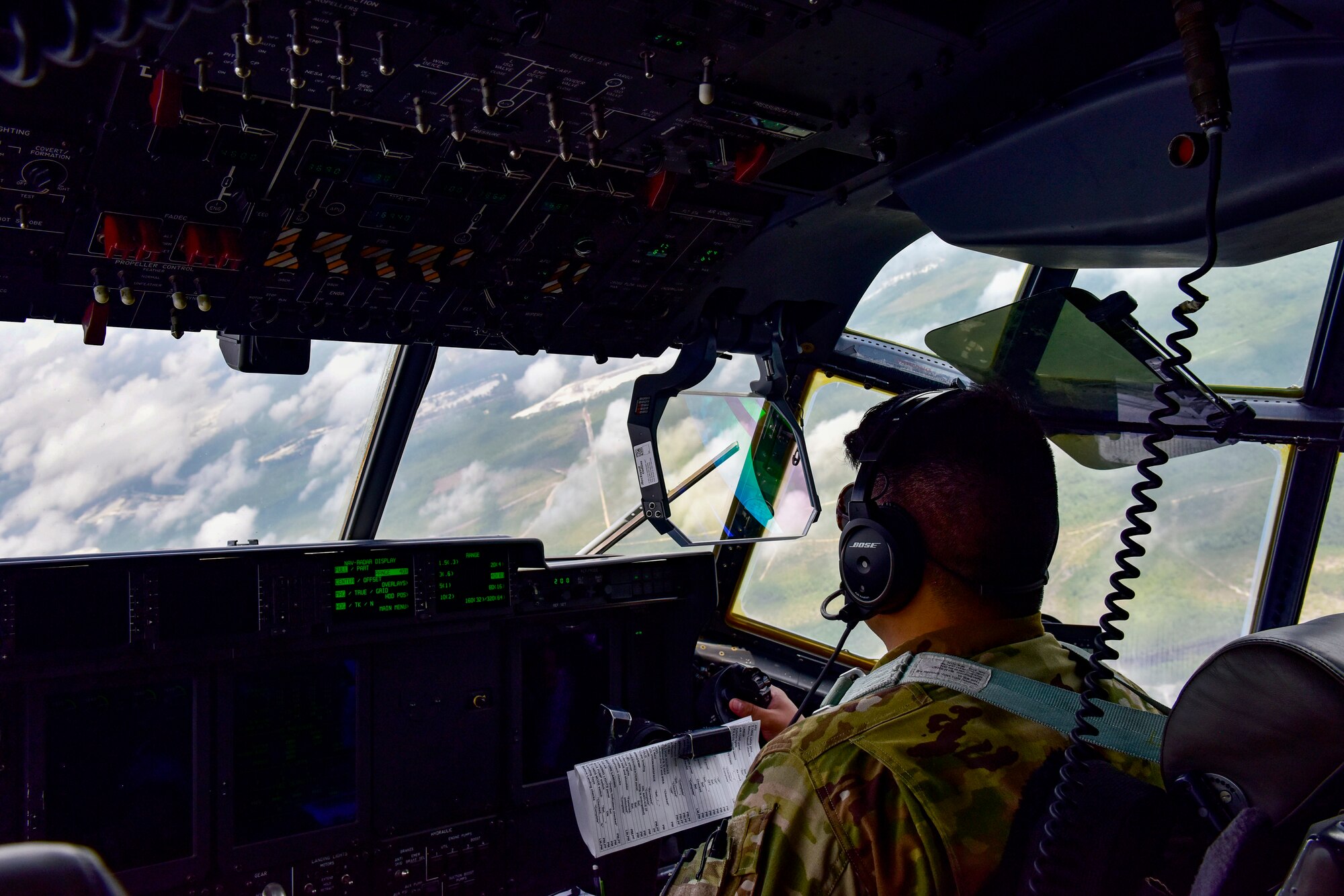 A pilot flies a C-130J Super Hercules