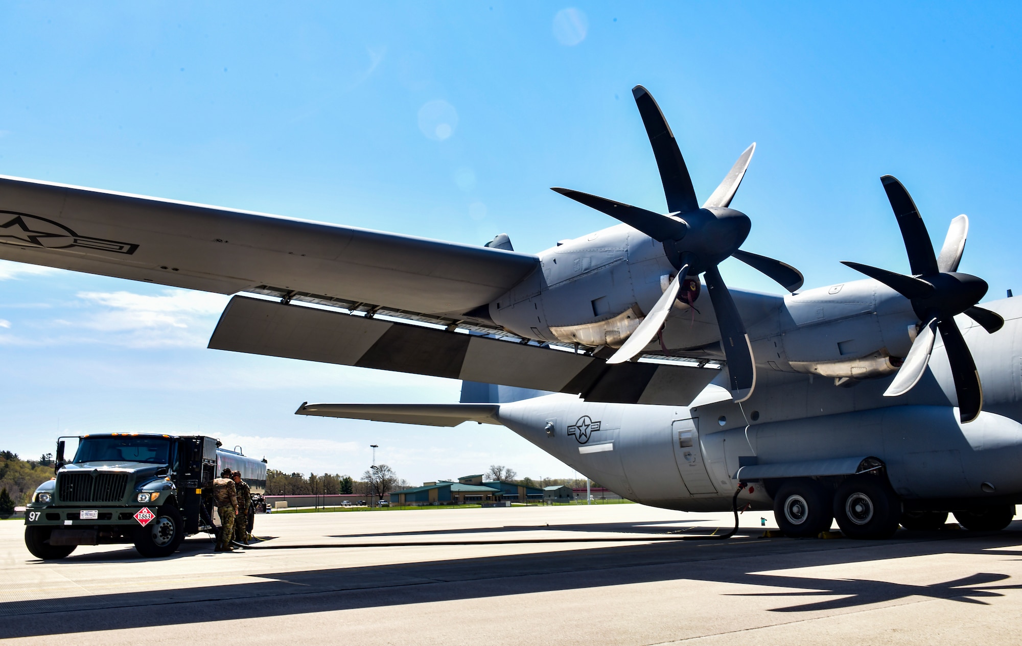 A C-130J Super Hercules is refueled on the flightline